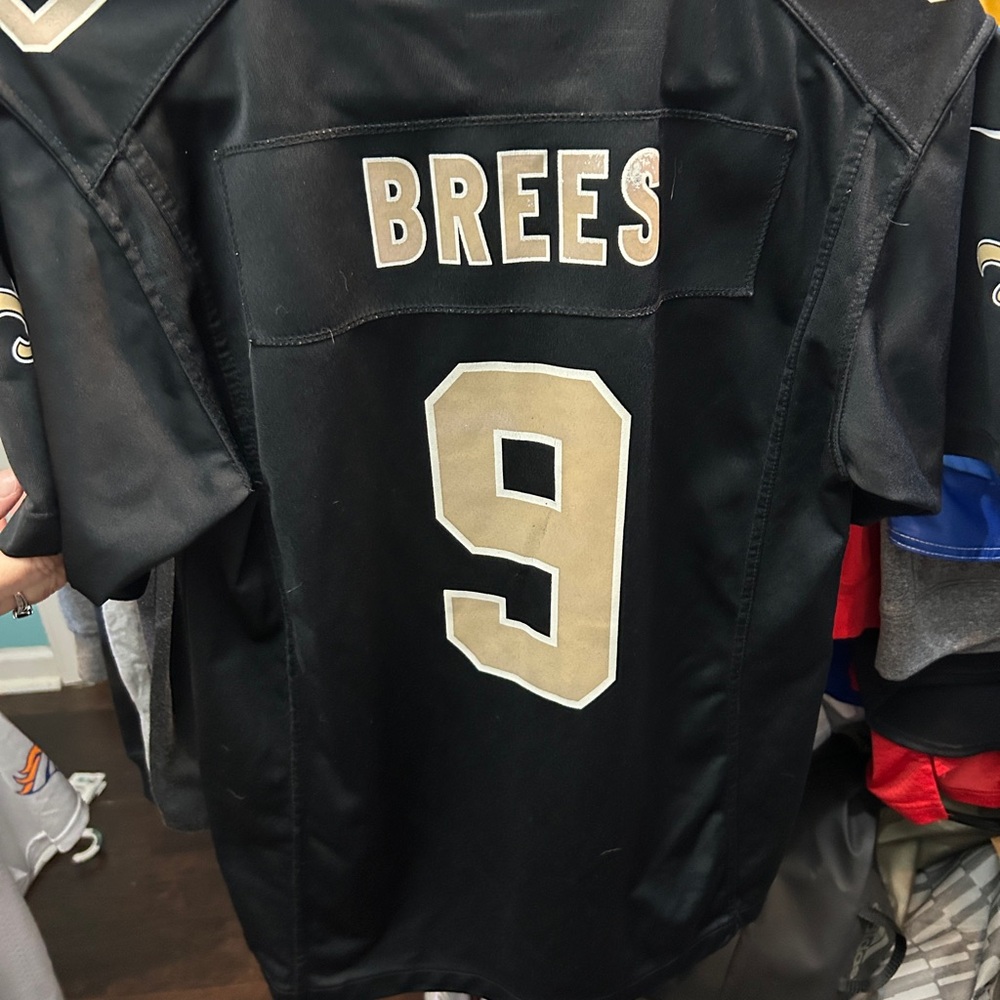 Nike Kids Black and Gold Jersey